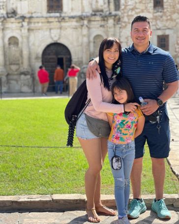 Michelle Waterson with her husband  Joshua Gomez and daughter in a trip.